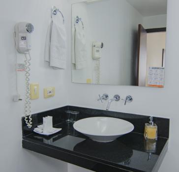 Junior suite room with room service at Hotel Neiva Plaza
