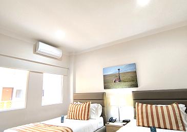Habitación VIP con dos camas del Hotel Neiva Plaza